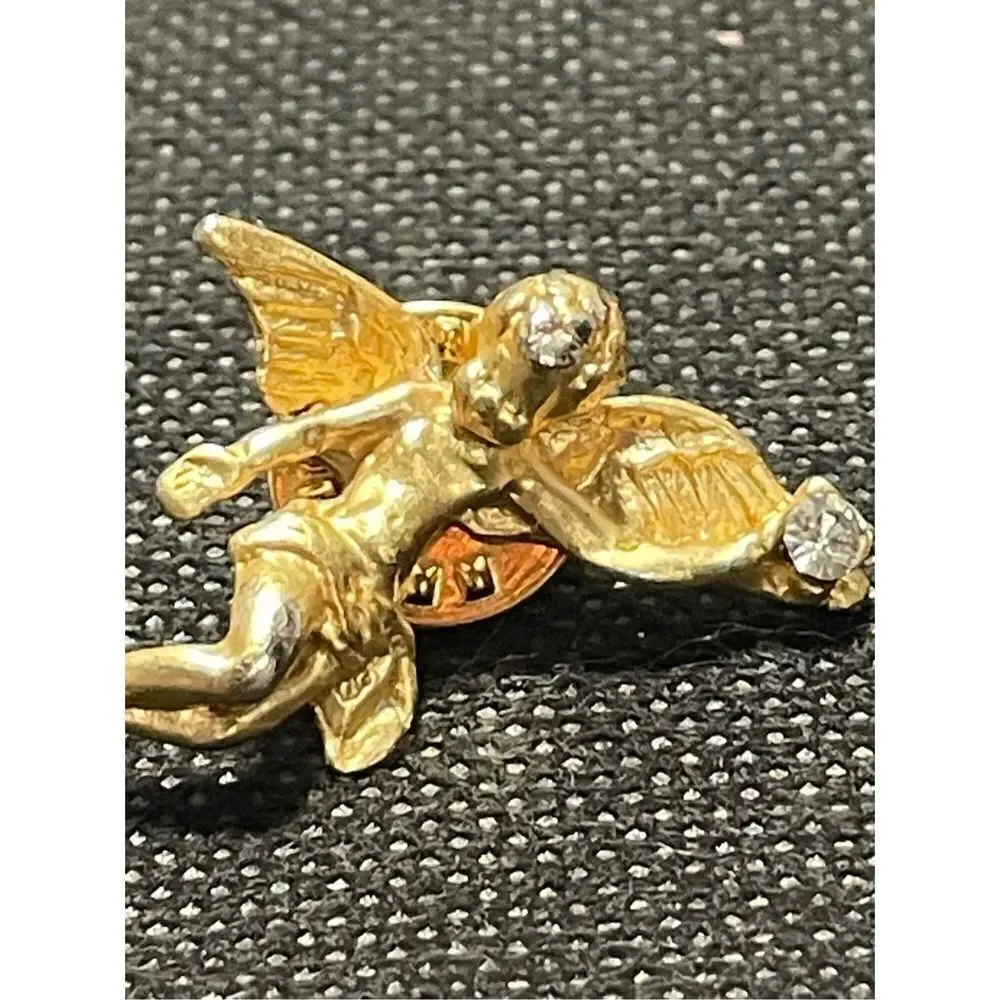 Two cherub pins￼